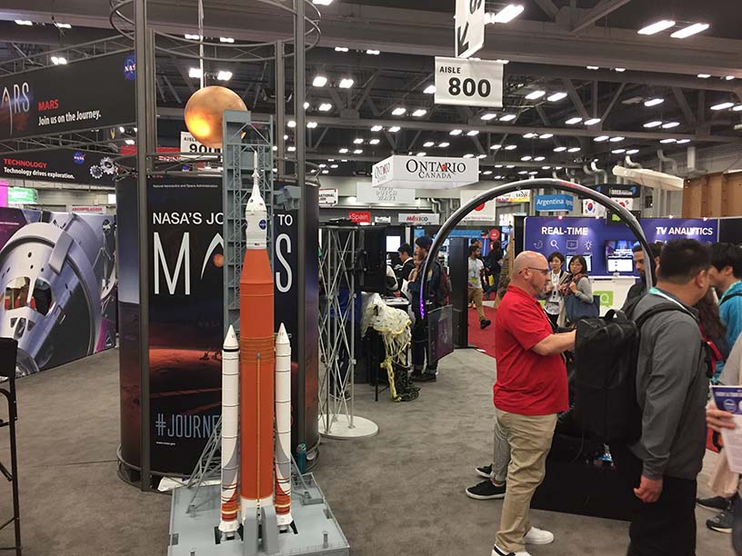 A photo of the NASA Journey to Mars tradeshow booth